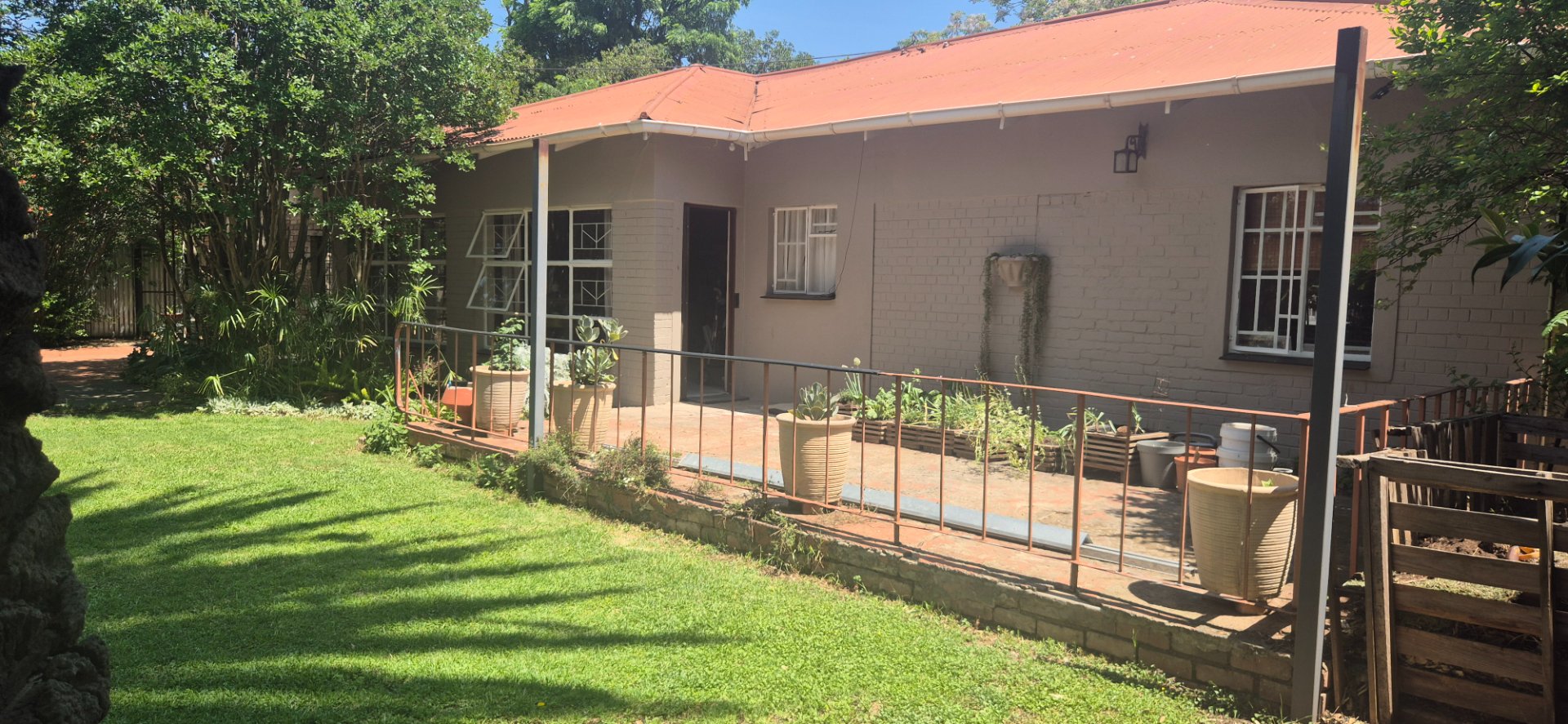 Spacious family home with open-plan living, double garage, pool, and flatlet potential photo 3