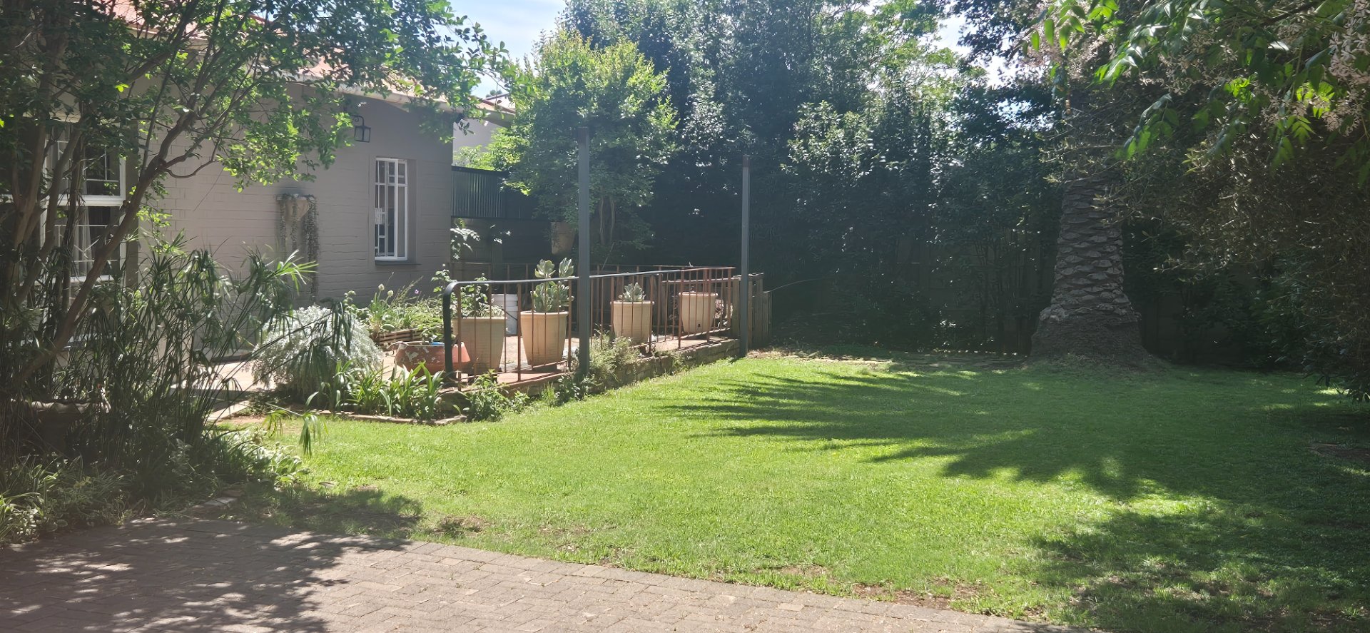 Spacious family home with open-plan living, double garage, pool, and flatlet potential photo 5