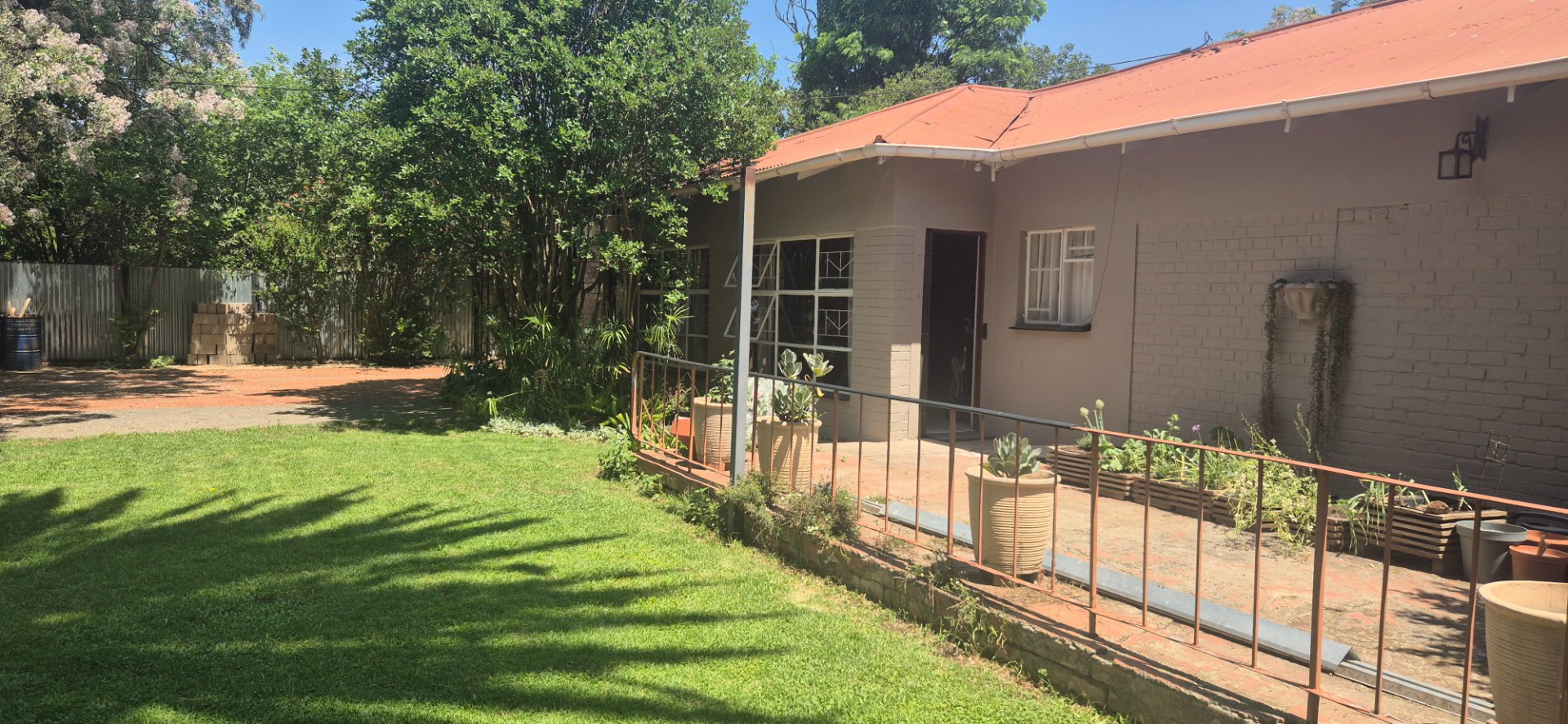 Spacious family home with open-plan living, double garage, pool, and flatlet potential photo 2