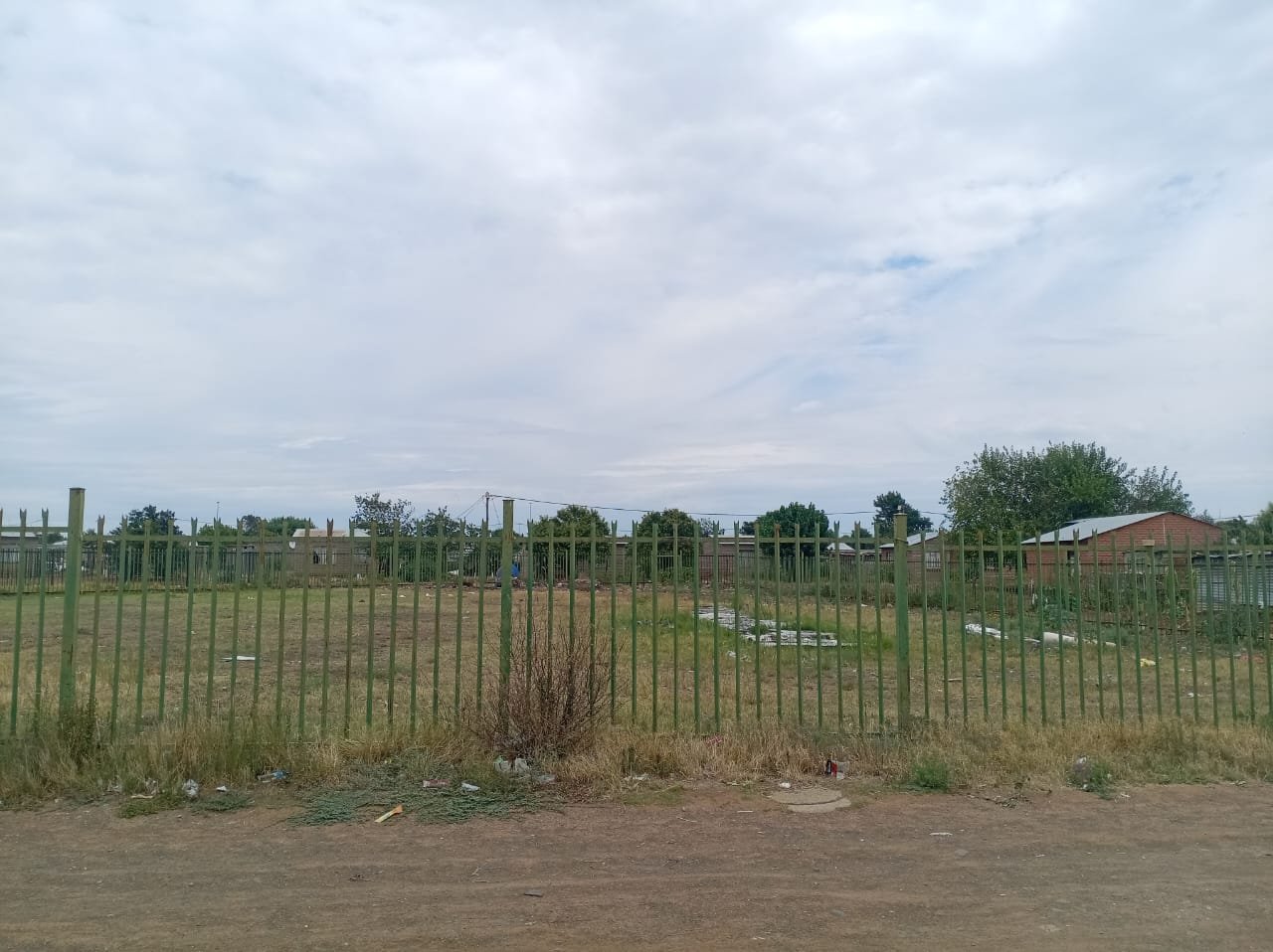 Fully Fenced Vacant Land