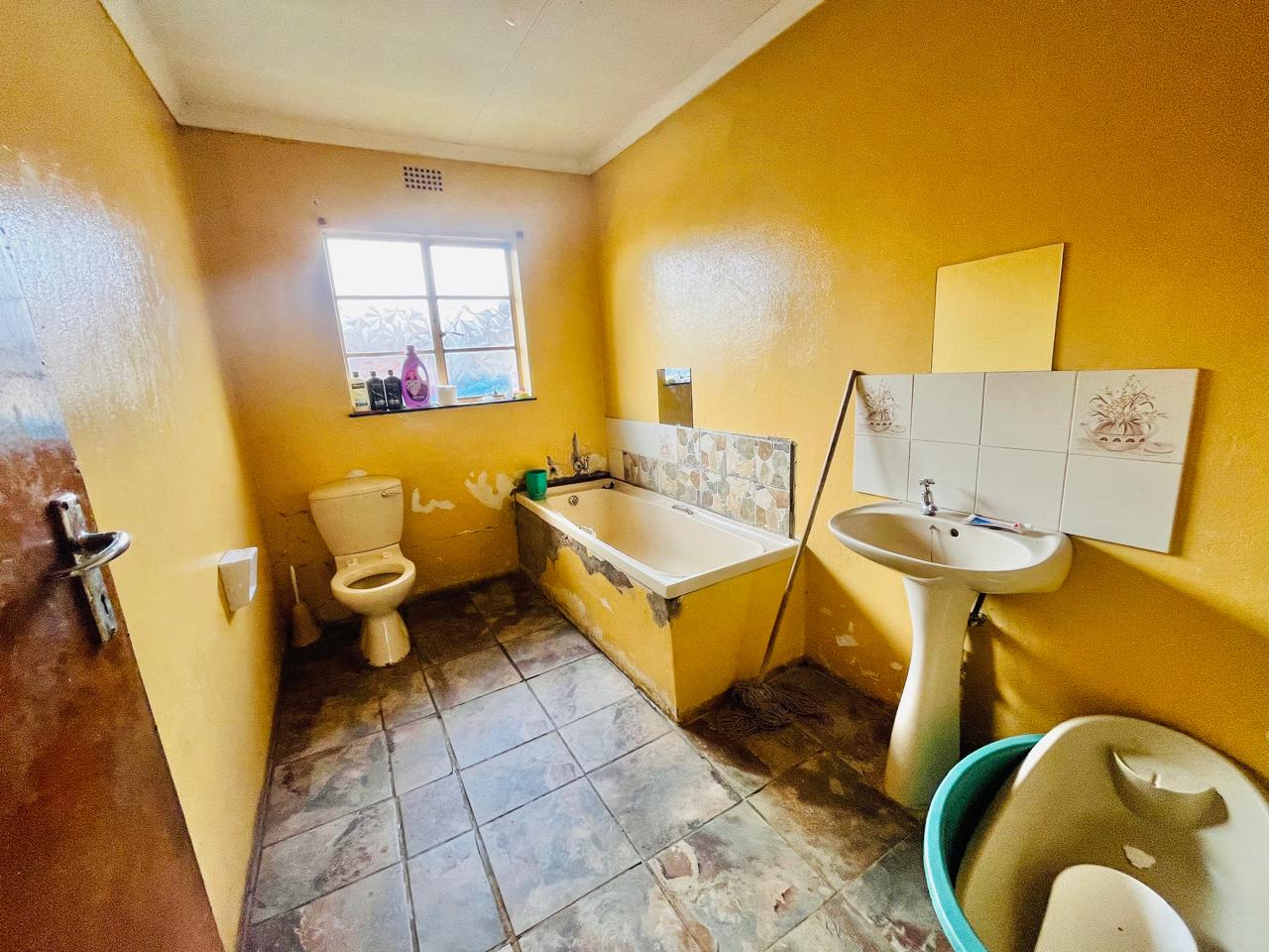 A house in H Section Botshabelo good for a family home or convert for investment. photo 5